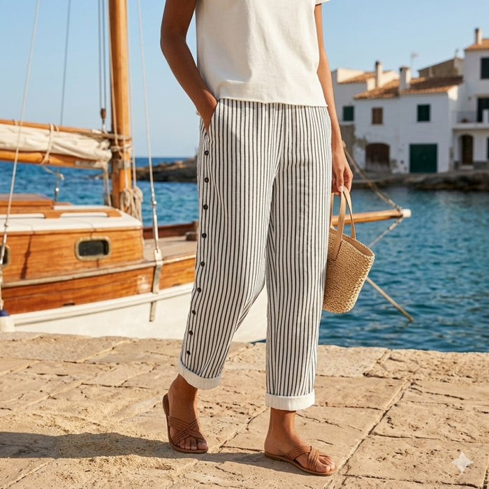 Caitlin striped button trousers in black stripe, front view with side pockets