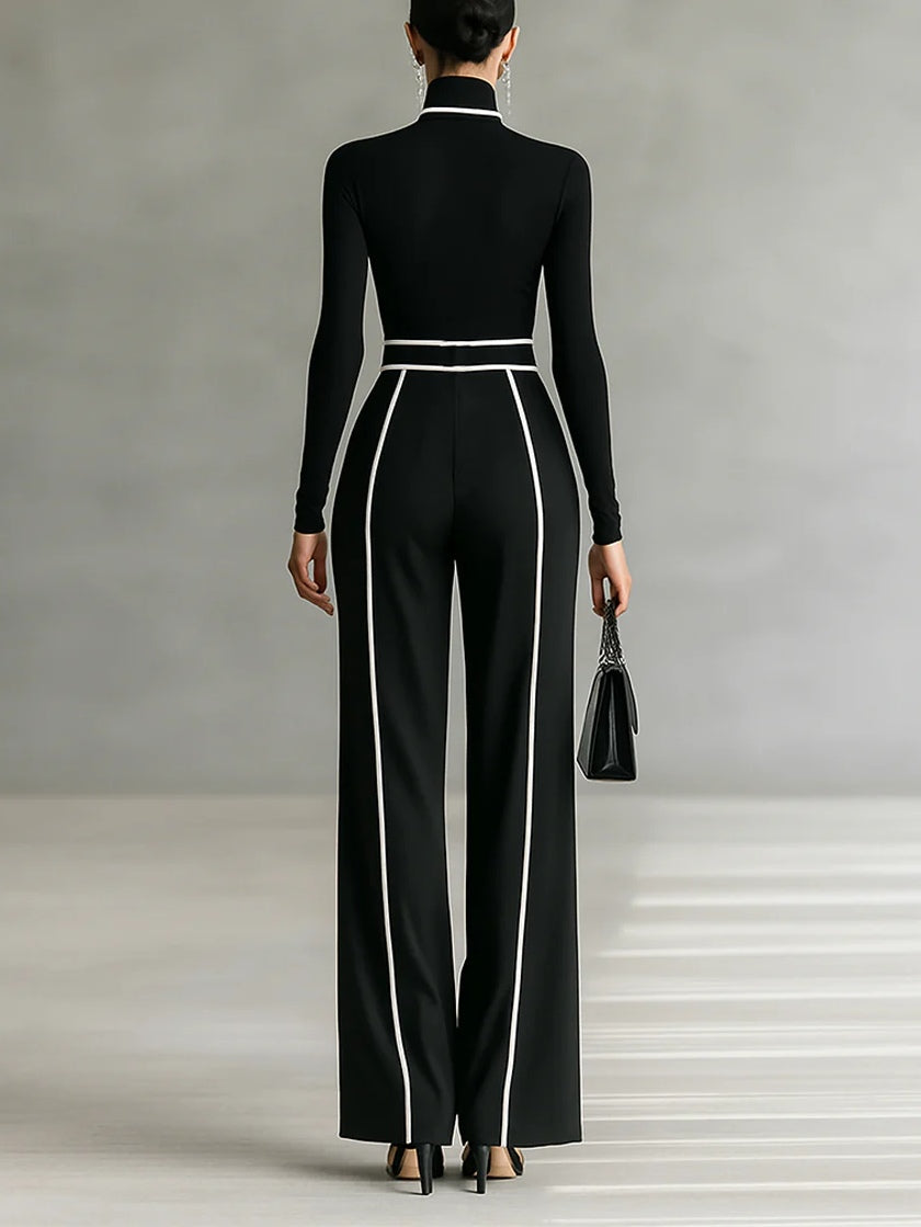 Adèle high-neck set in black with white trim, back view