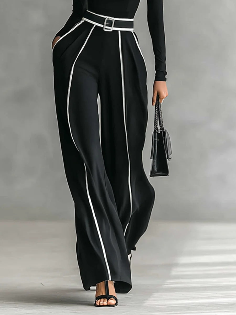 Adèle wide-leg trousers in black with white piping and side pocket
