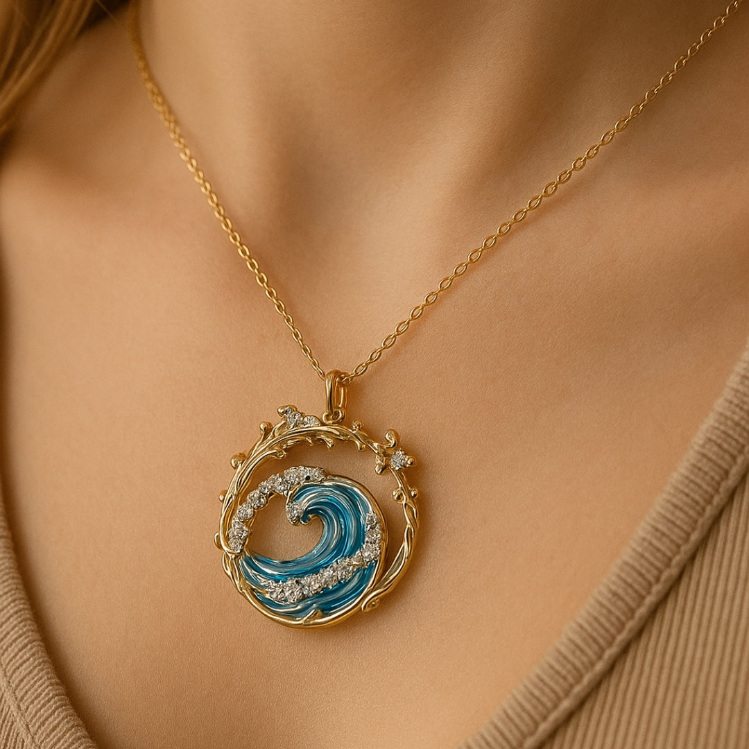 Eternal Wave necklace in gold worn on the neck, front detail view