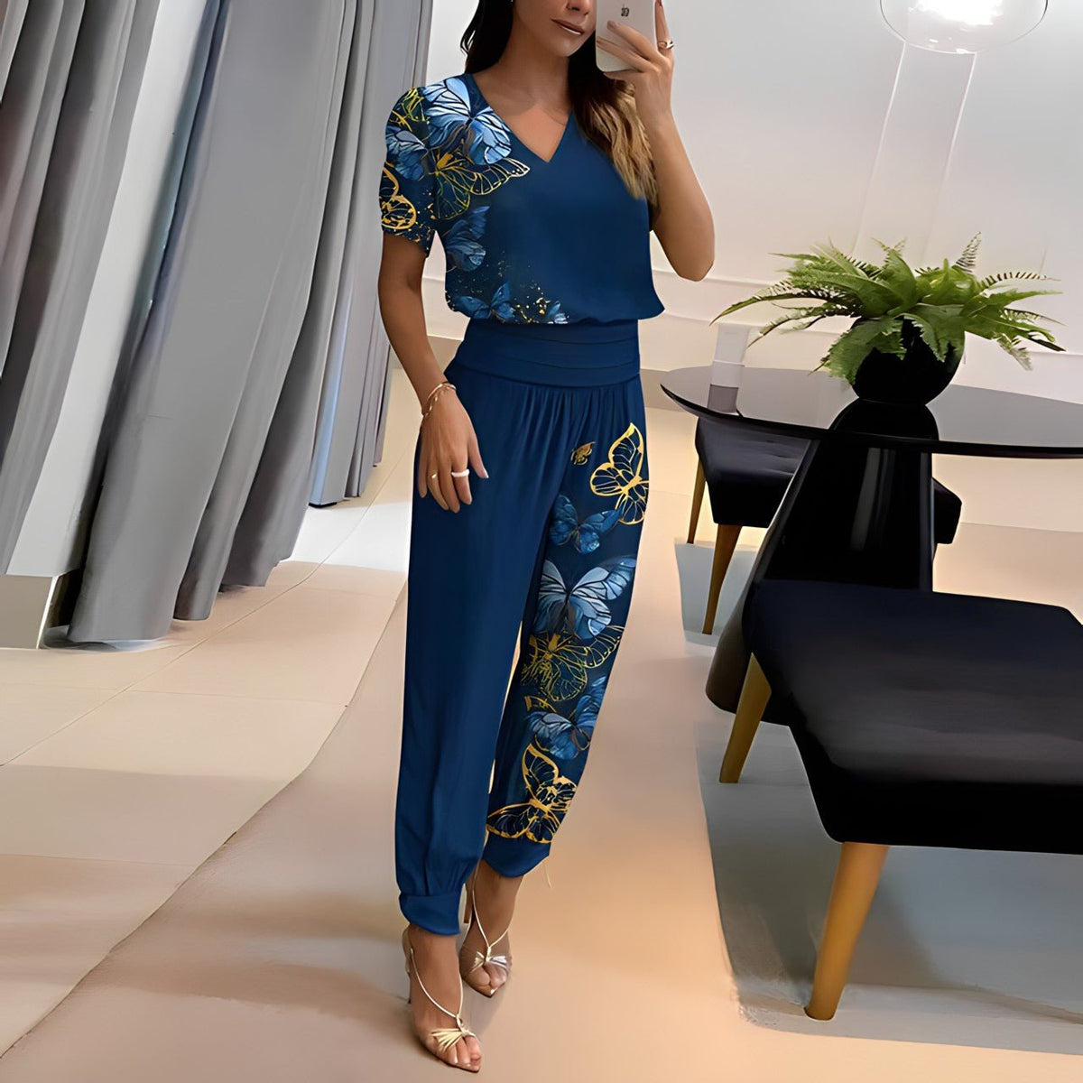 Vivienne two-piece set in blue with butterfly print, full-length front view