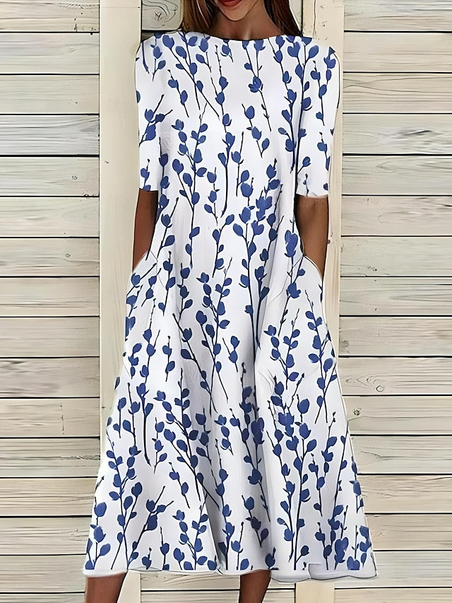 Annie coastal bloom dress in white with blue branch print, front view