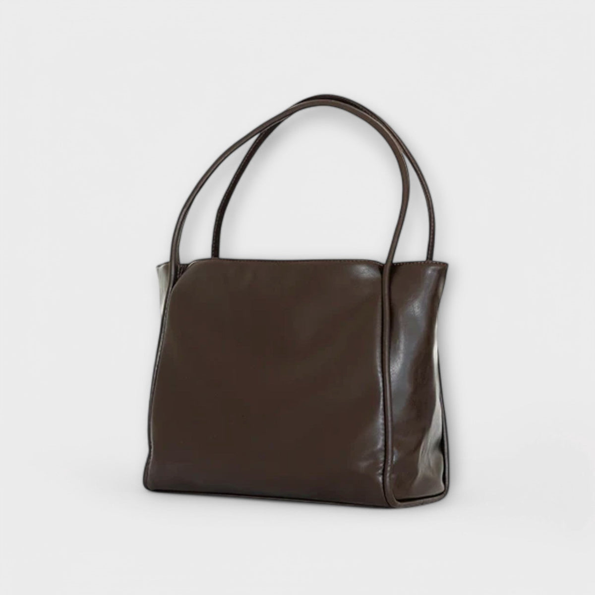 Valerie Blair tote bag in dark brown, three-quarter side view