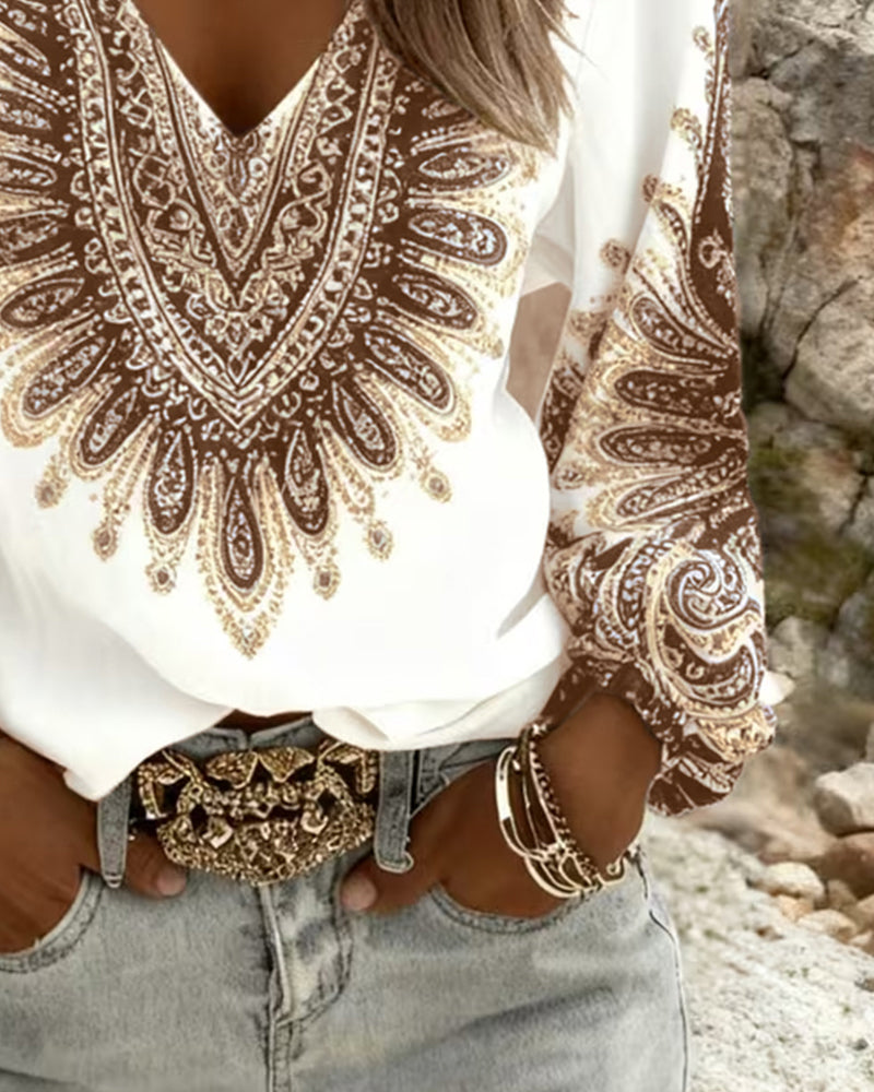 Elara paisley print blouse in brown, detail of print and cuff