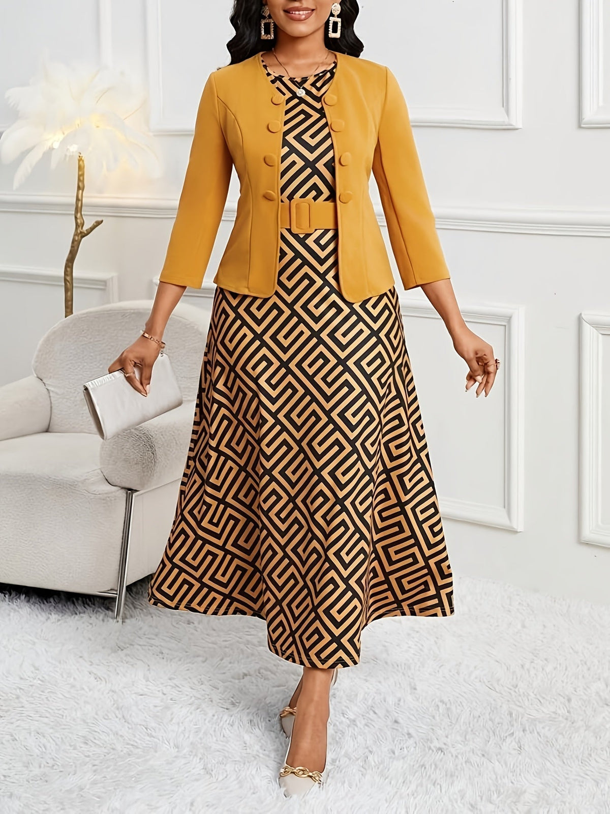 Amelie Lane belted set in mustard yellow with black geometric print, styled indoors