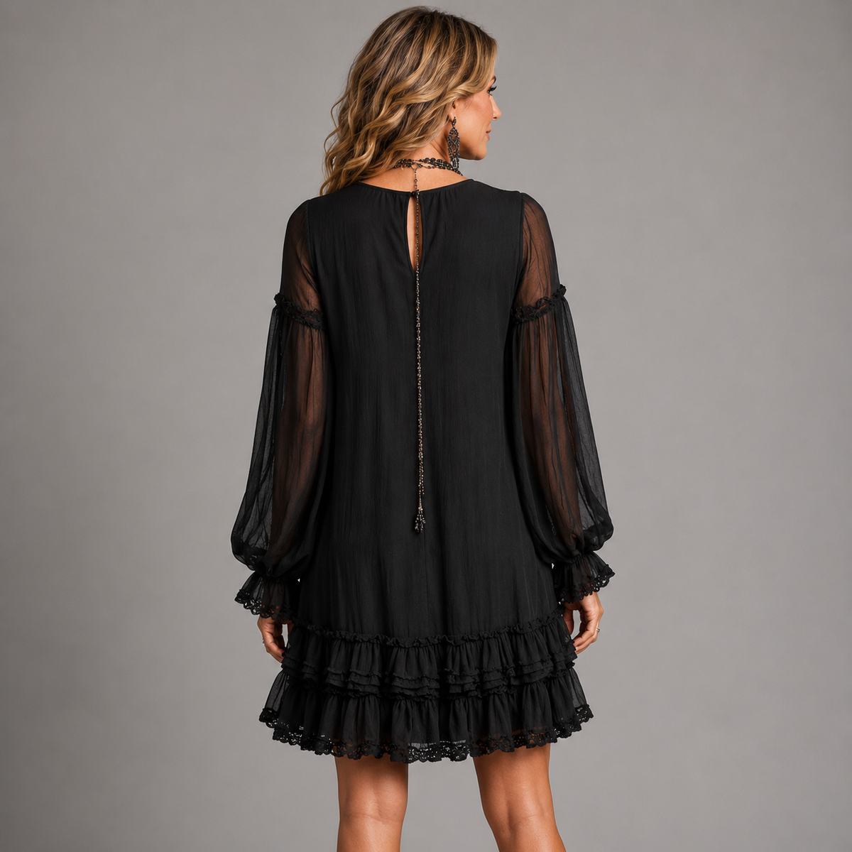 Oriella mini dress in black, back view with keyhole tie