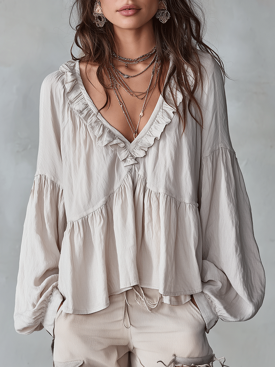 Vintage-inspired bohemian blouse in white, front view with frilled V-neckline