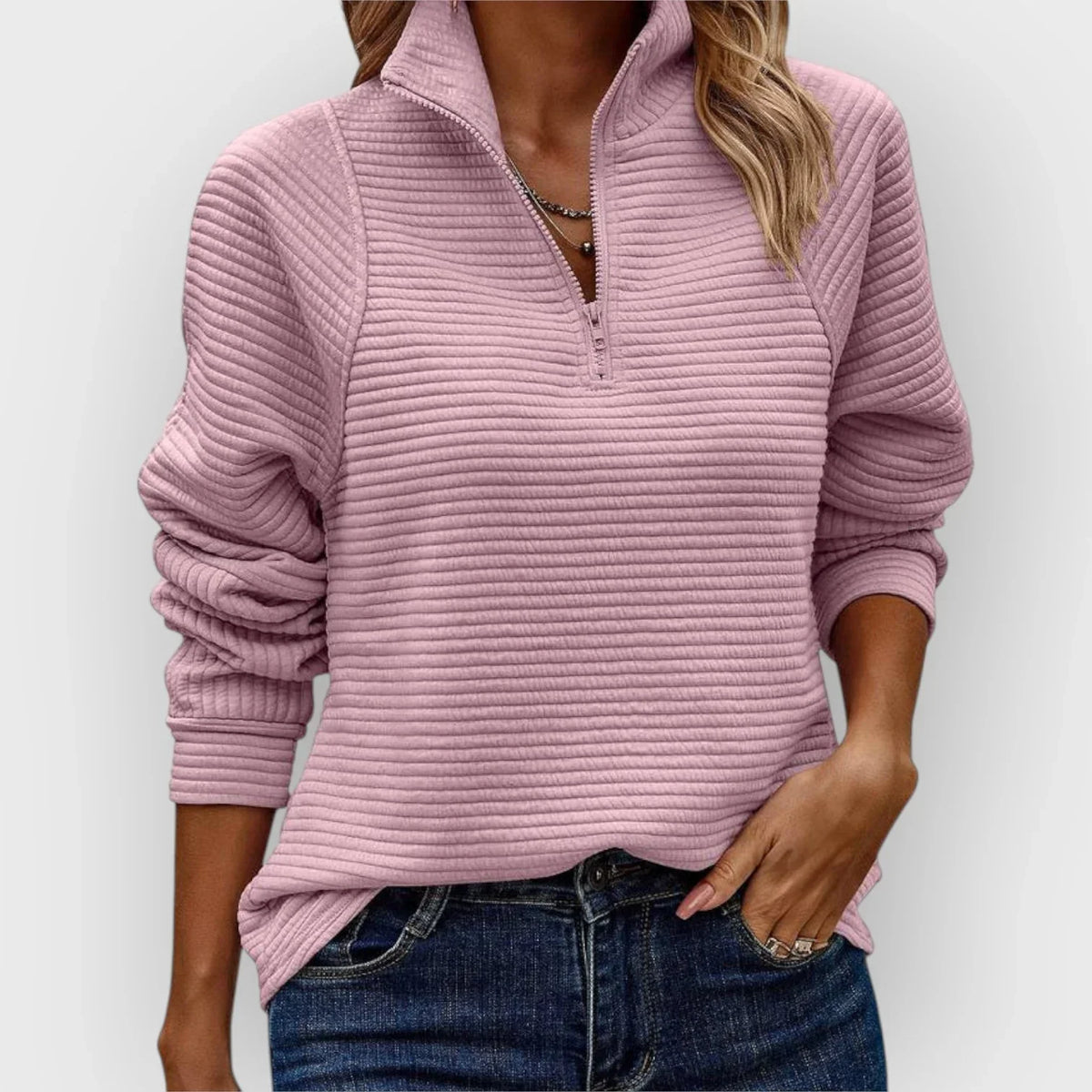 Veylin halfzip pullover in light pink, front view worn with jeans