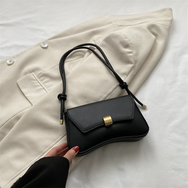 Cécile mini shoulder bag in black, front view