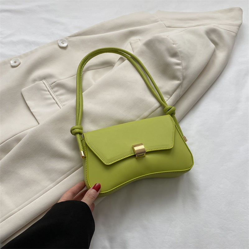 Cécile mini shoulder bag in green, front view