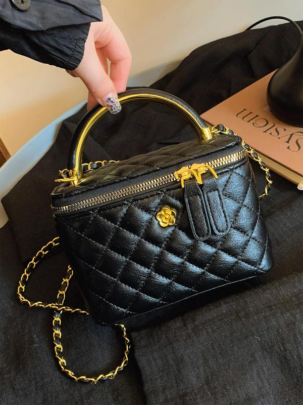 Alice quilted crossbody bag in black with gold handle and chain strap