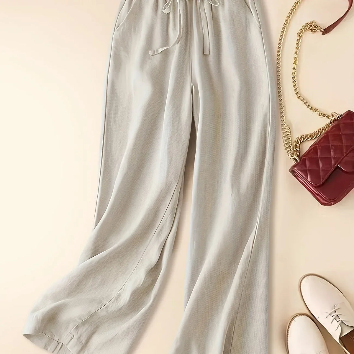 Imara wide-leg drawstring trousers in beige, flat front view