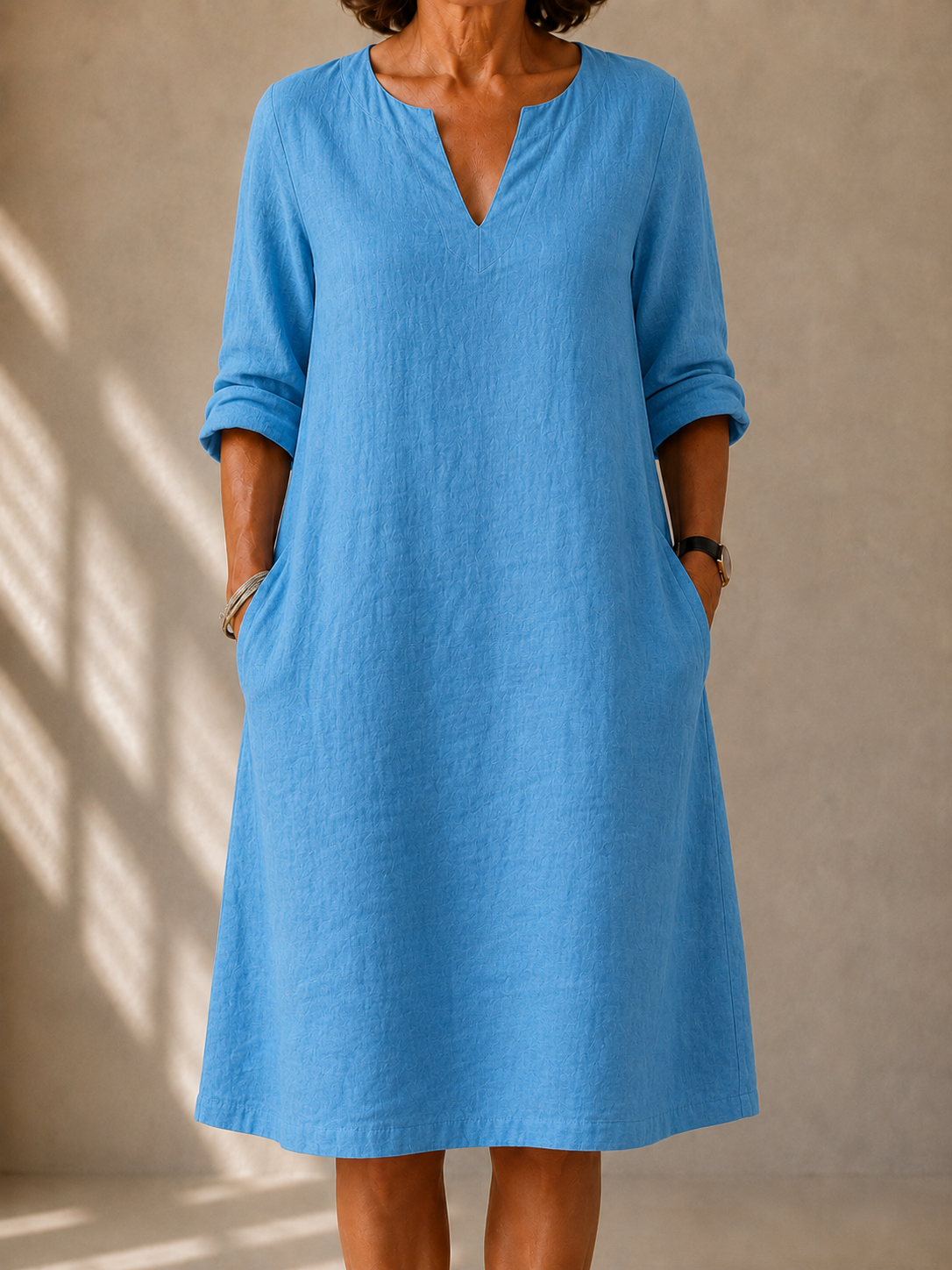 Claire casual V-neck dress in bright blue, front view