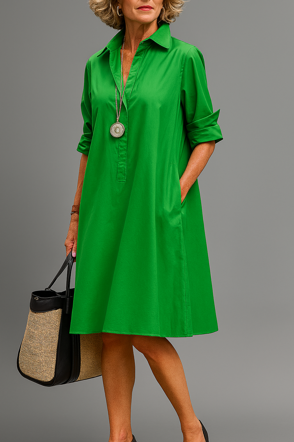 Vyana midi dress in green, full-length front view with collar and pendant