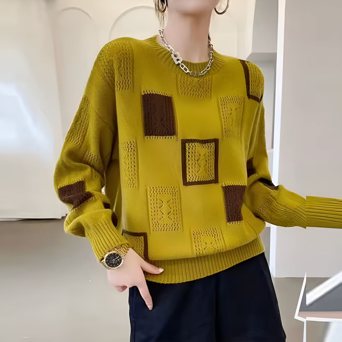 Zaydeanne knit sweater in yellow, showing ribbed cuffs and hem