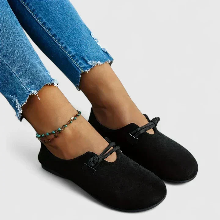 Margot loafers in black, front view worn with denim