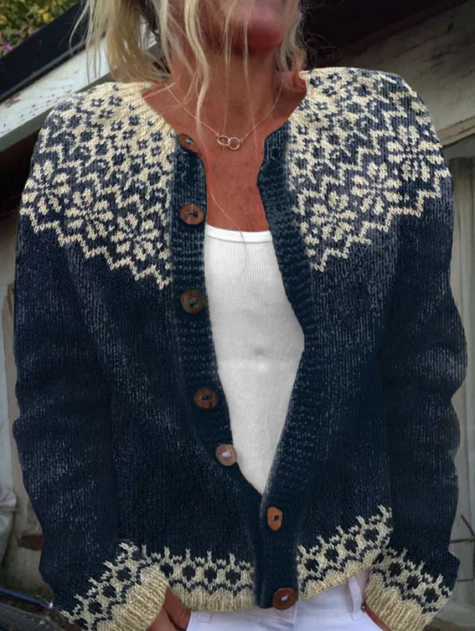 Hattie knitted cardigan close-up showing floral yoke and wooden buttons