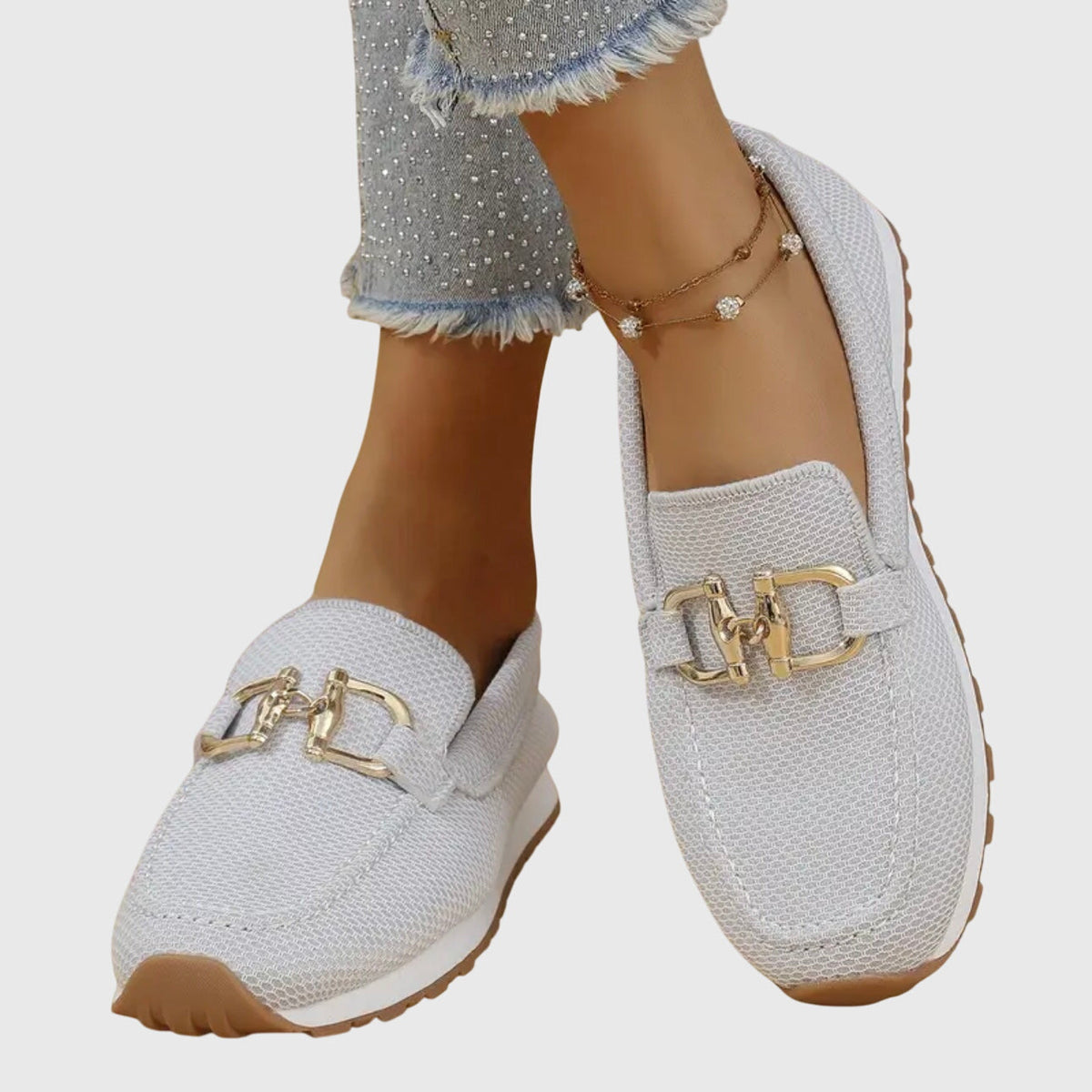 Shiloh white loafer trainers worn, angled view of mesh upper