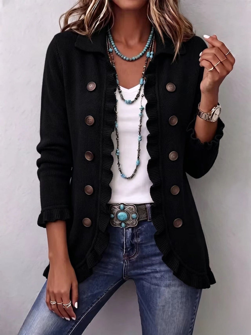 Camila knit ruffle jacket in black, front view worn with jeans