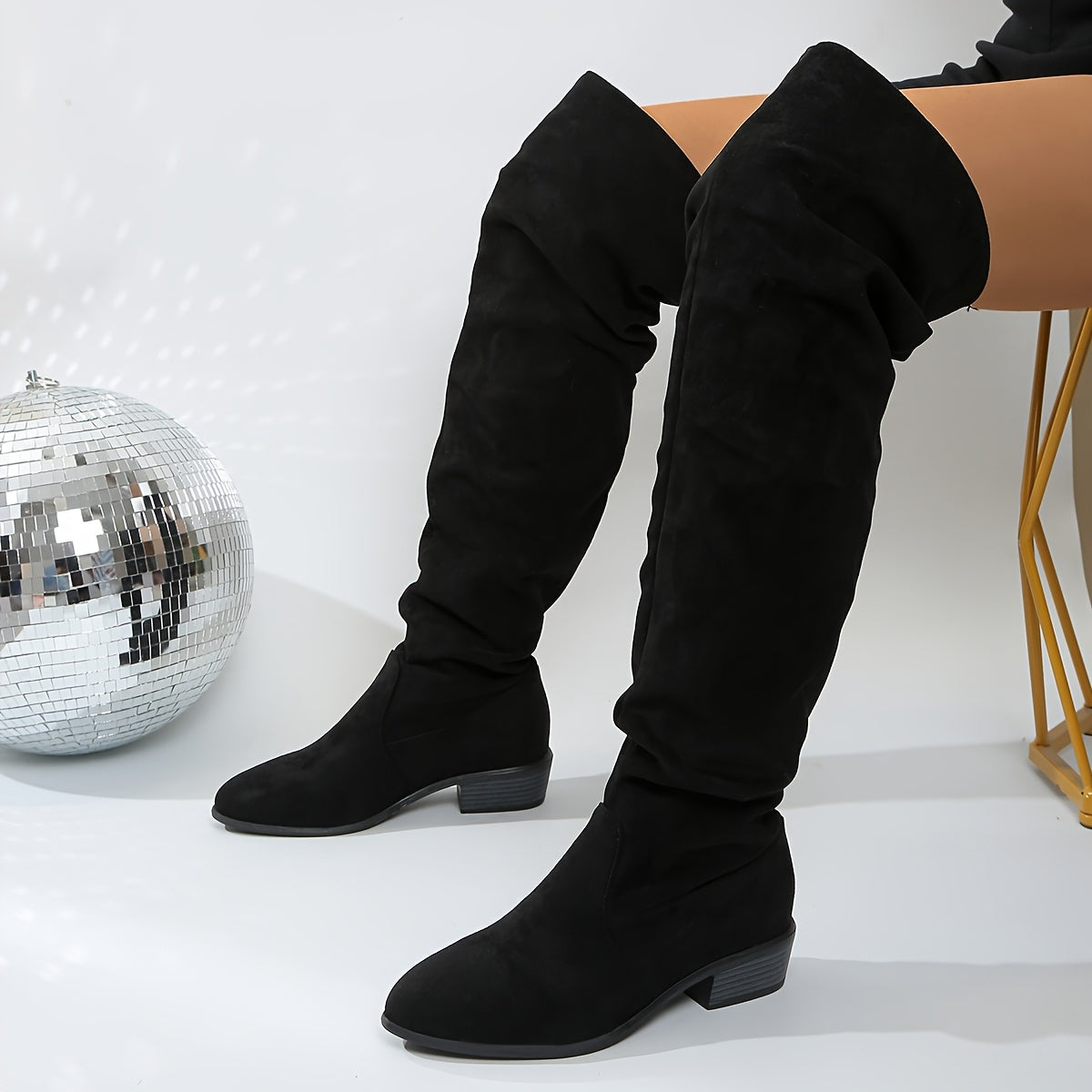 Ione over-the-knee boots in black, side view with block heel