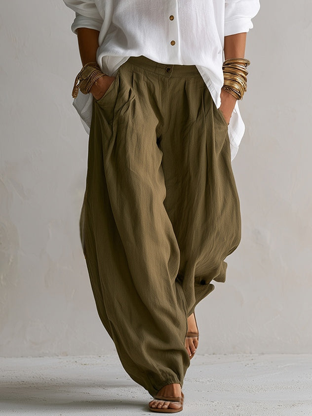 Capucine lantern trousers in olive, close view of waist and pockets