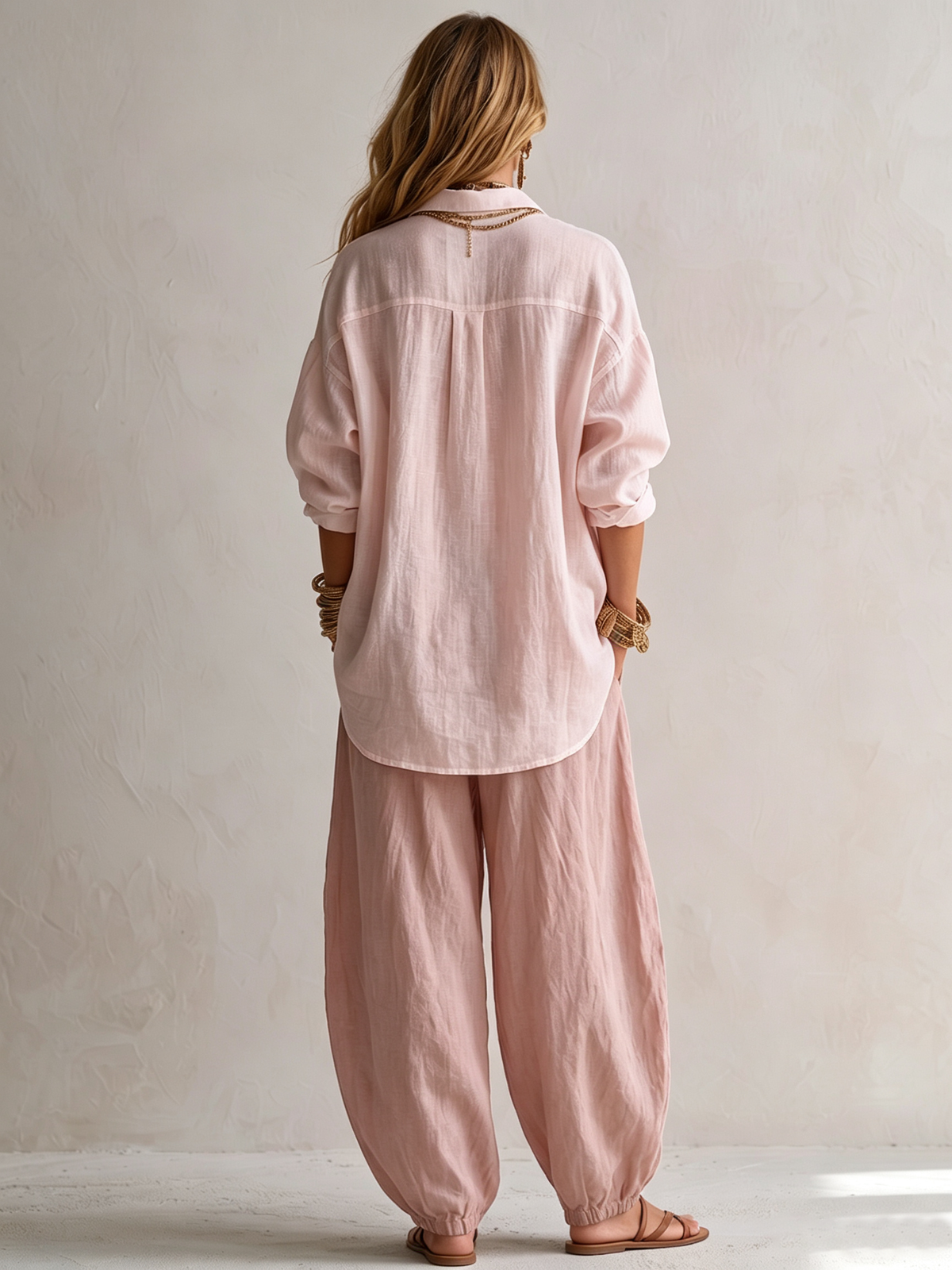Capucine blouse and lantern-trouser set in pink, back view