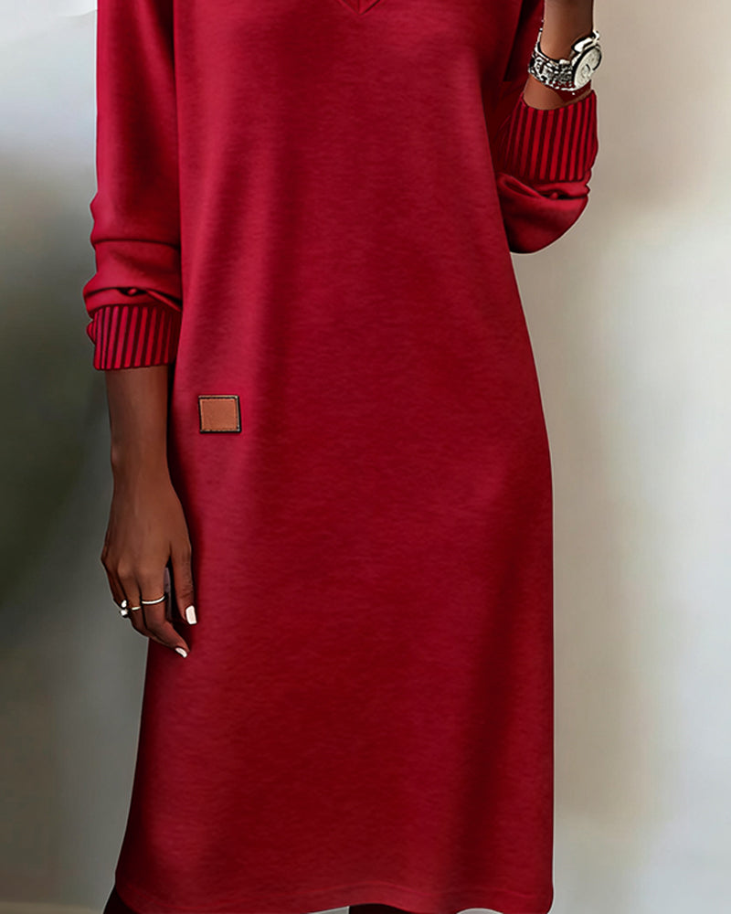 Jana dress in red, close-up of striped cuff and skirt