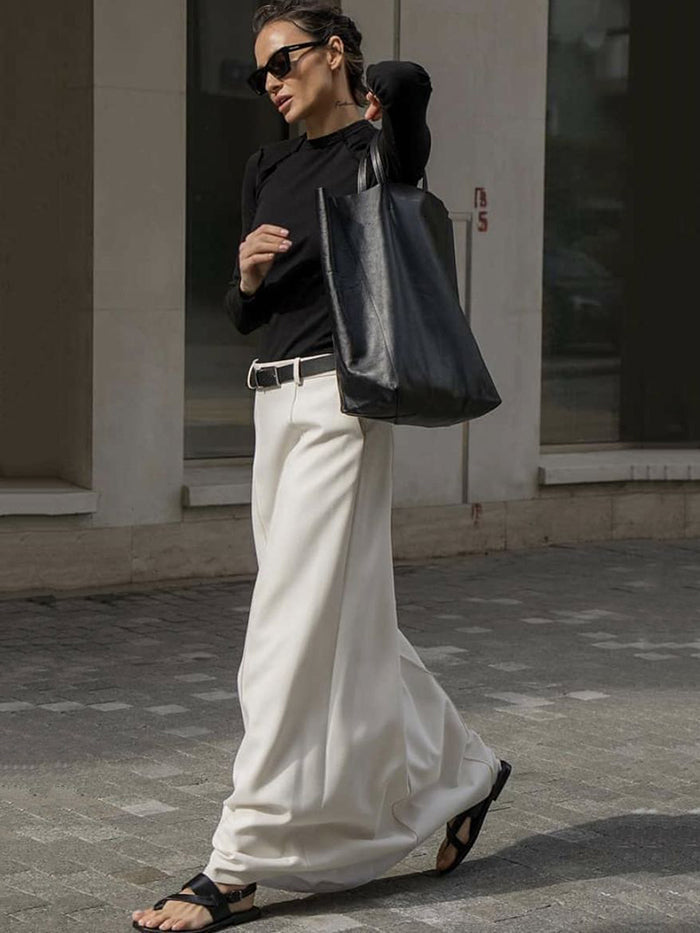 Katharine H-line midi skirt in white, walking full-length view