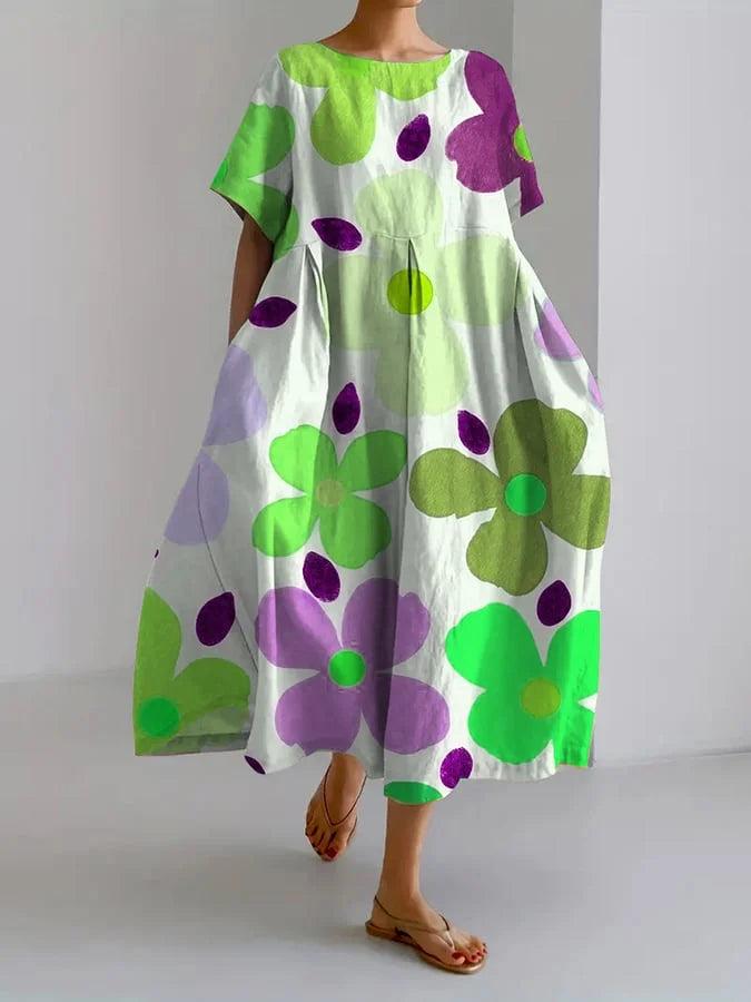 Henrietta summer dress in green and purple floral print, full-length front view