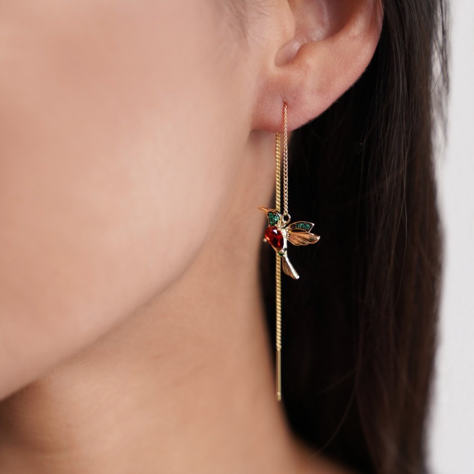 Stefanie gold earrings in gold, worn side view showing long chain