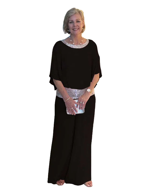 Ember two-piece occasion set in black, full-length front view
