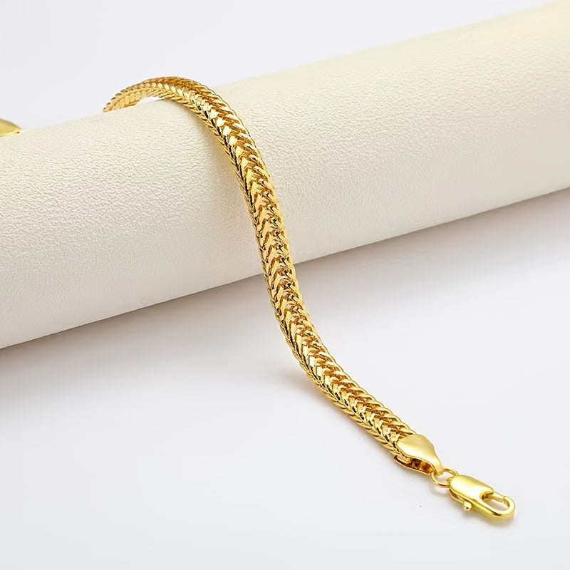 Gold fox tail chain bracelet with lobster clasp, angled view