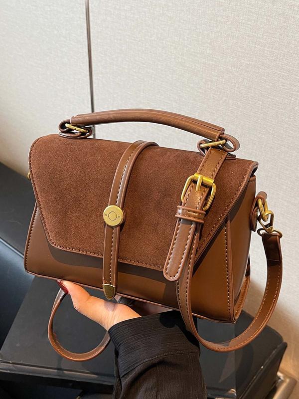 Alwina shoulder bag in brown, angled front view