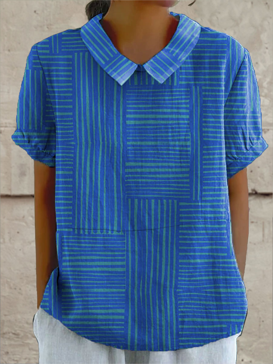 Maya striped geometric blouse in blue and green, front view on model