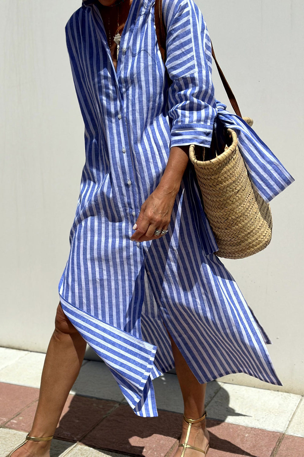 Sophia striped shirt dress in blue, close view of front placket and hem