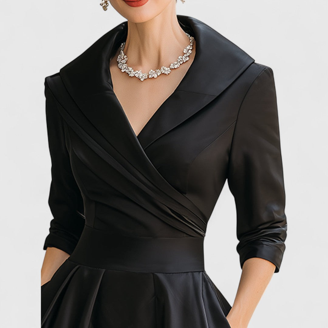 Marley Quinn midi dress in black, close-up of wrapped collar neckline