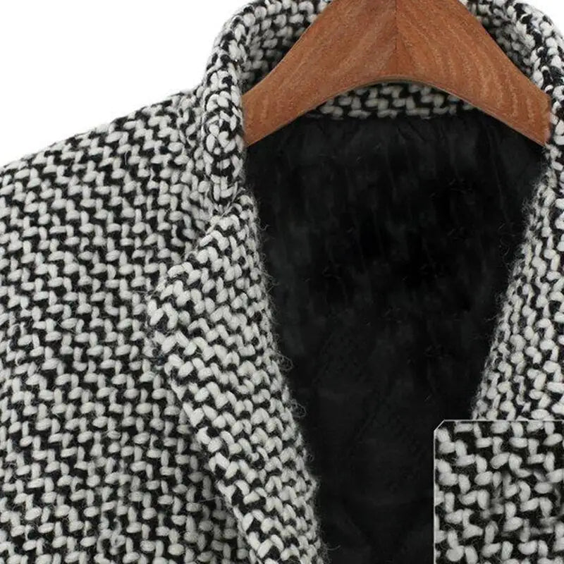 Evadine coat collar close-up showing woven check and quilted black lining