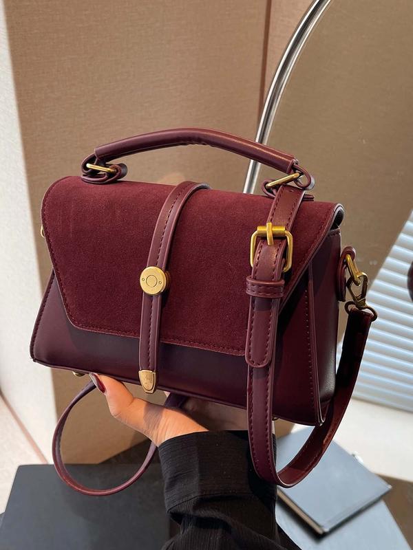 Alwina shoulder bag in burgundy, front view with twist button closure