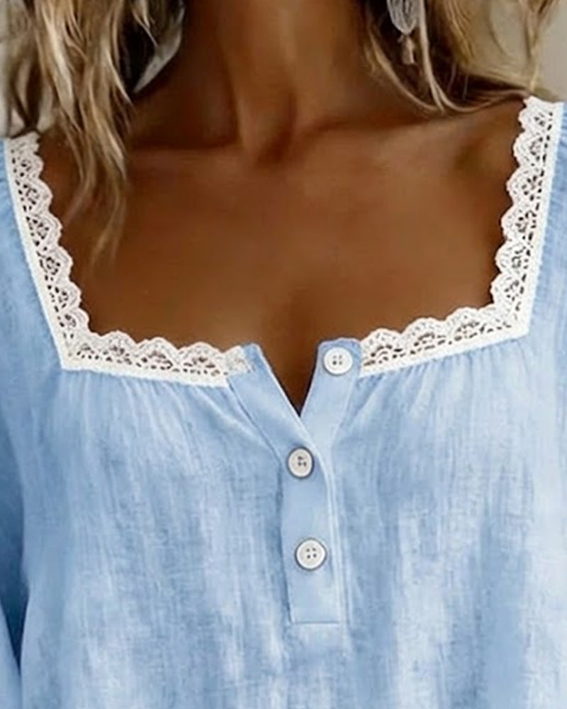 Elodie blouse in light blue, close view of lace neckline and buttons
