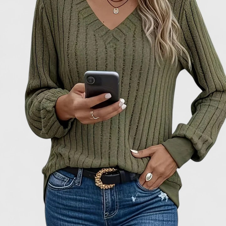 Celestinah ribbed V-neck sweater in green, front view with jeans