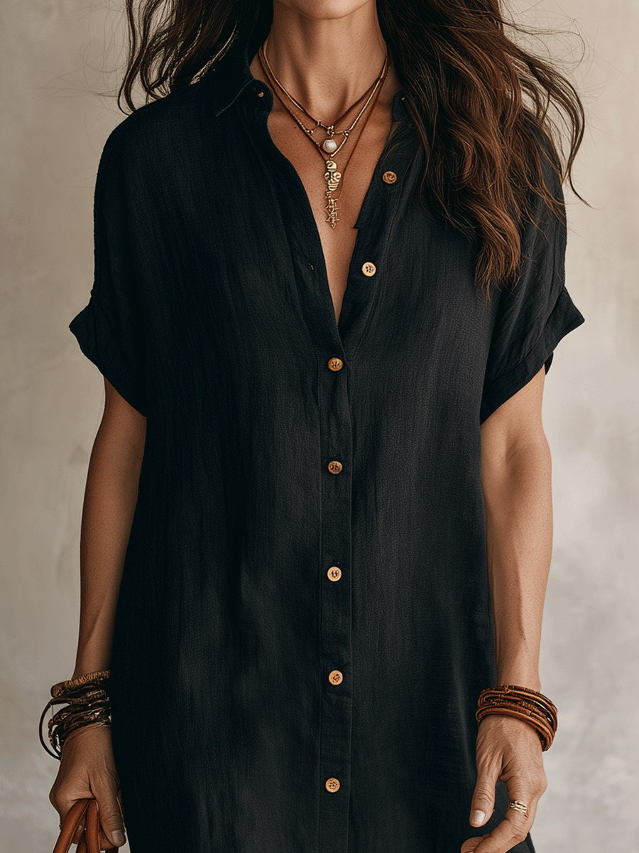 Close-up of black linen shirt dress collar and front placket