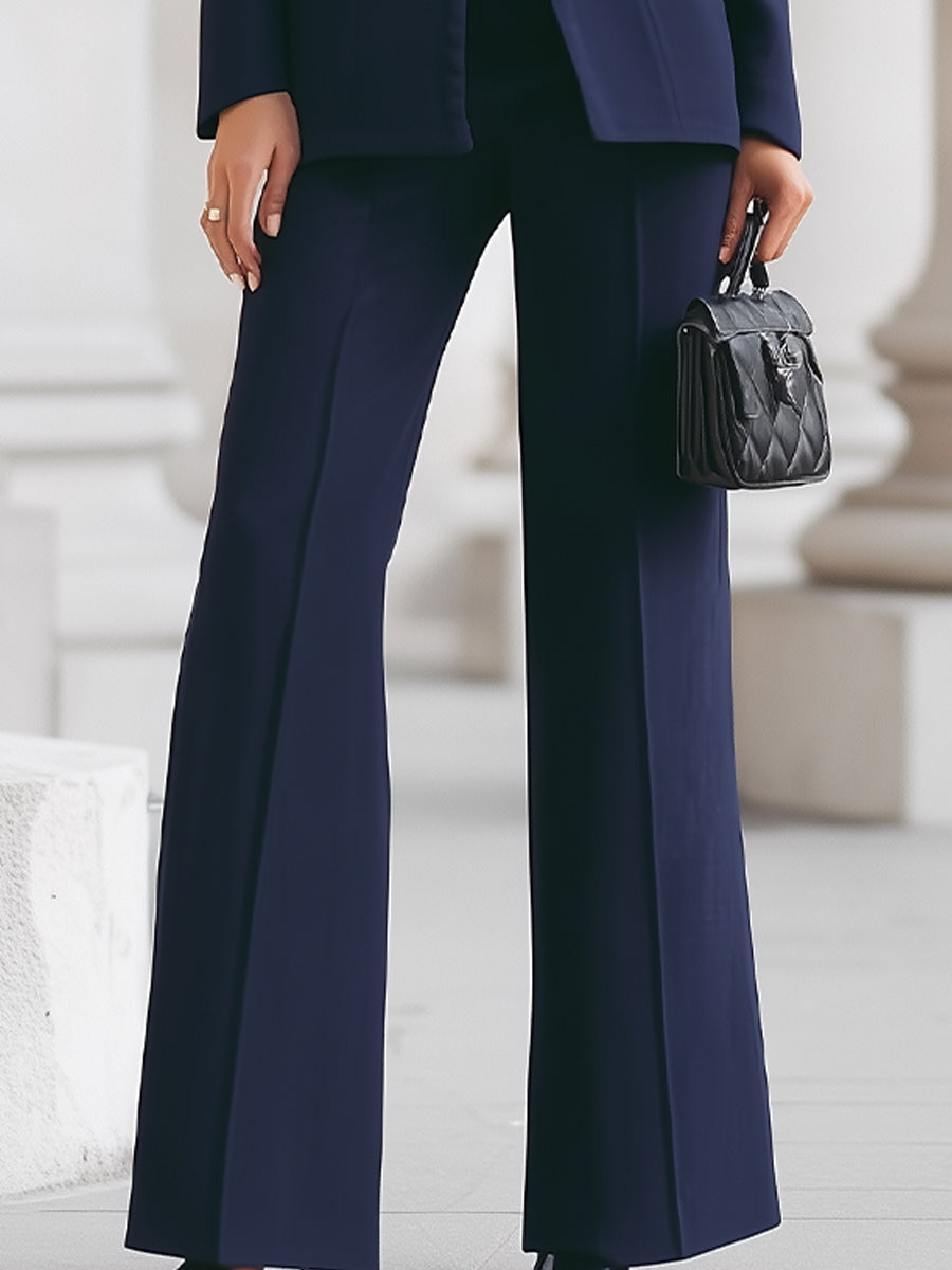 Adrielle suit set in navy blue, close view of flared trousers