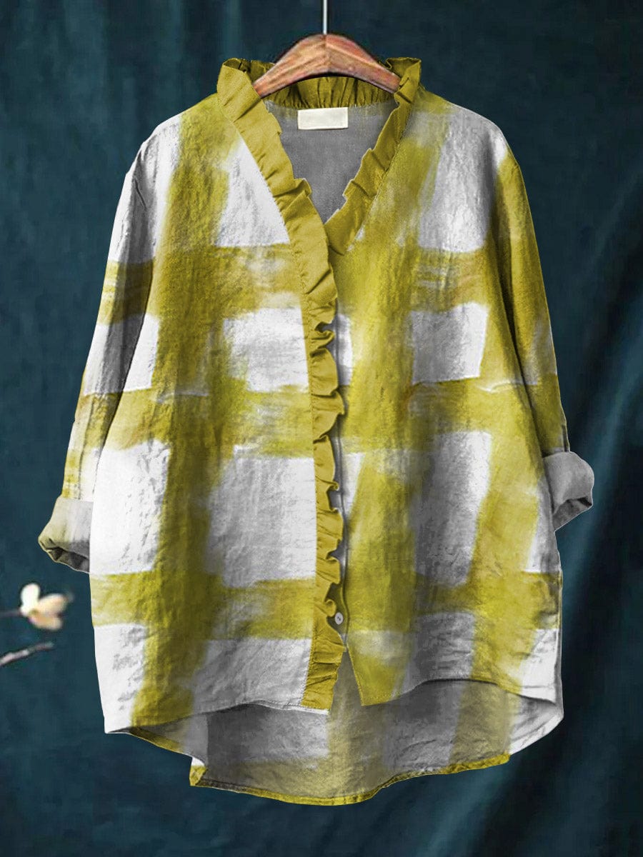 Veyra blouse in chartreuse yellow and white brushstroke check, front view on hanger