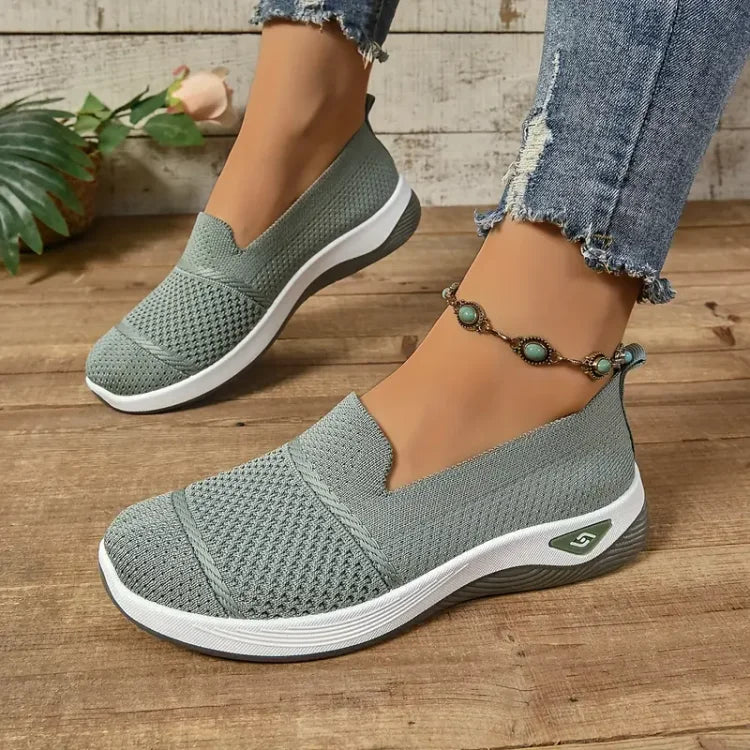 Azalea slip-on sneakers in green, worn front view