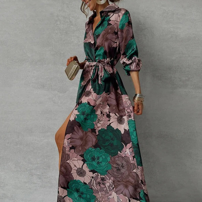 Lily belted maxi dress in green and pink floral print, side view with front slit