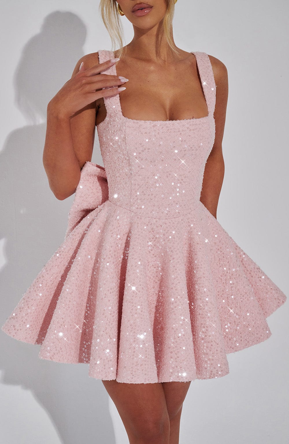 Romy sequin dress in pink, close-up of square neckline and bodice