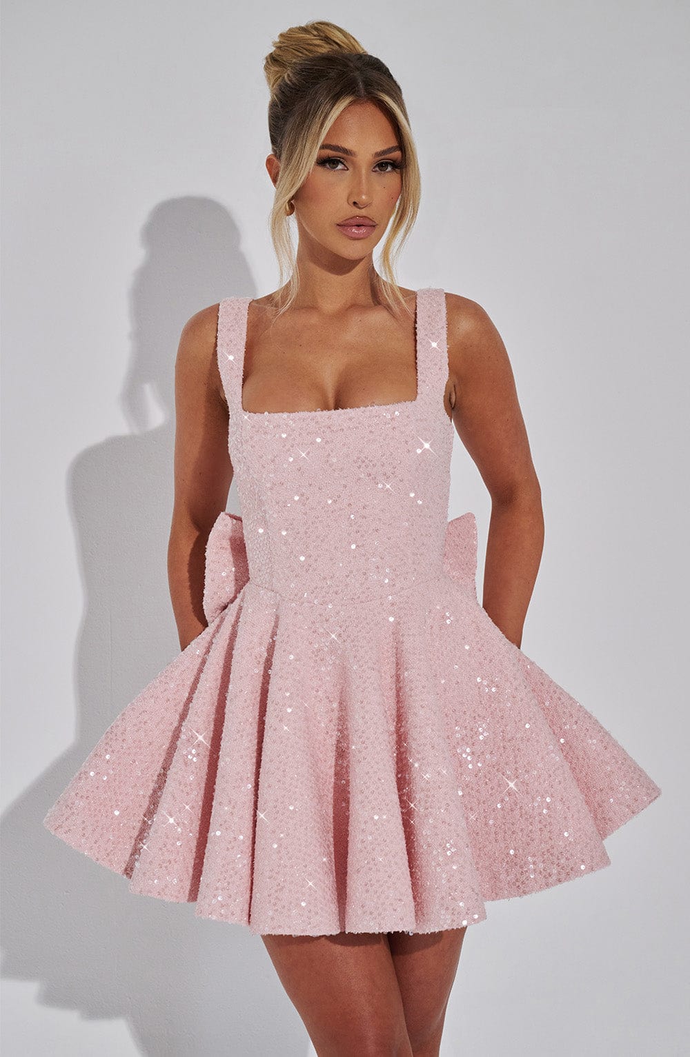 Romy sequin bow mini dress in pink, front view