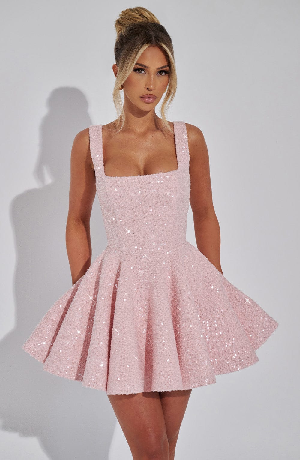 Romy pink sequin bow dress, full front view on model