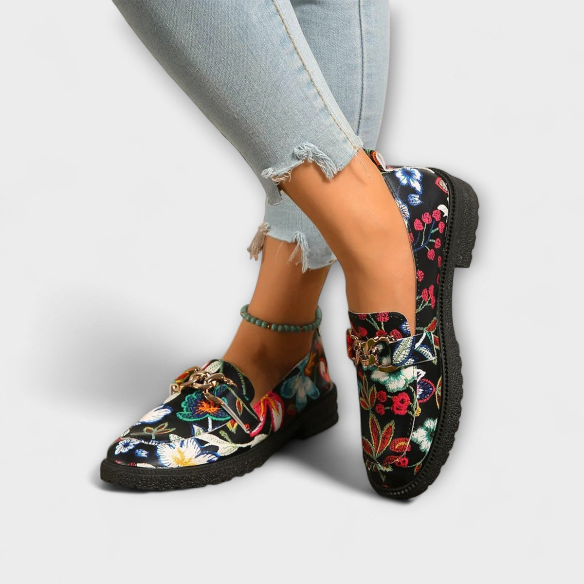 Camille loafers in black multicolour floral print, worn with cropped jeans