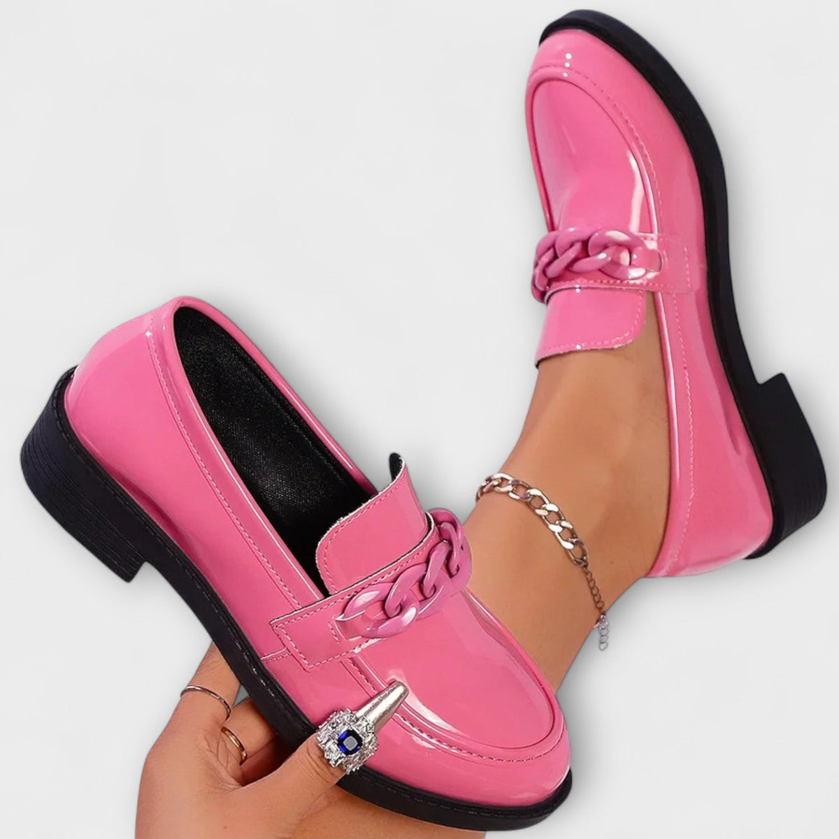 Delia chain loafers in pink, pair shown from above